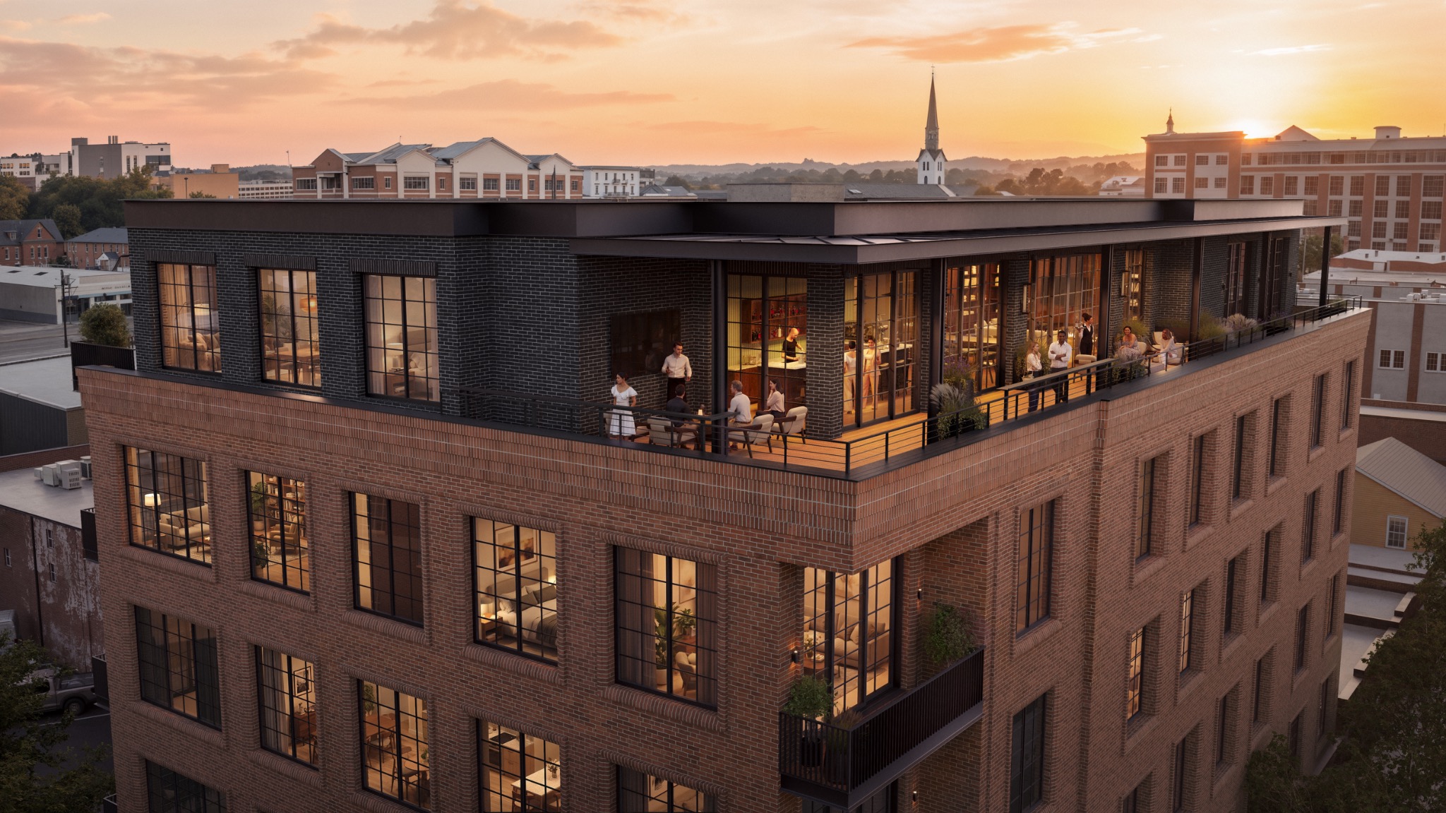 The Everly rooftop terrace overlooking Downtown Athens at sunset